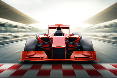 A Formula 1 racing car crossing the finish line.